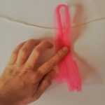 Tira de tul doblada por la mitad