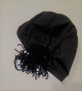 Flequillo pegado al gorro