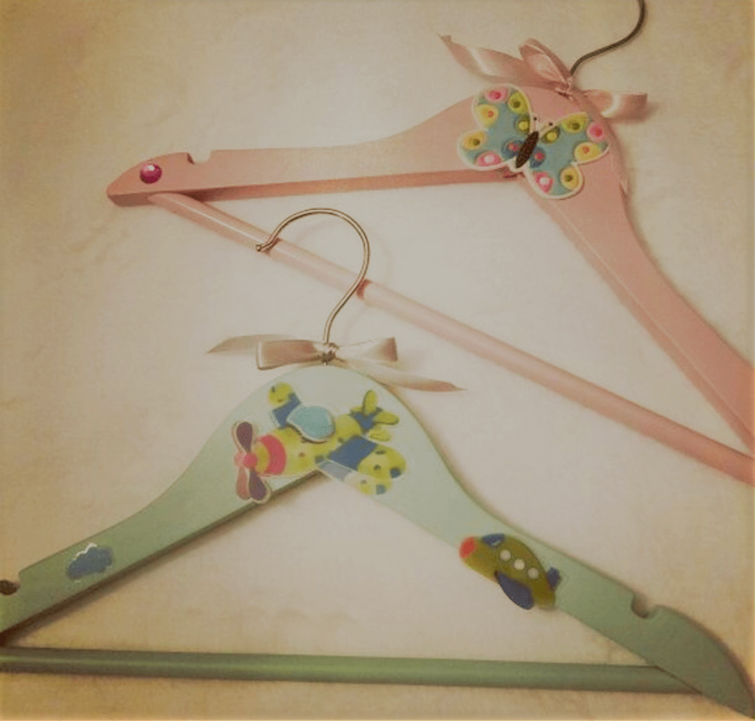 Perchas azul o rosa, a escoger